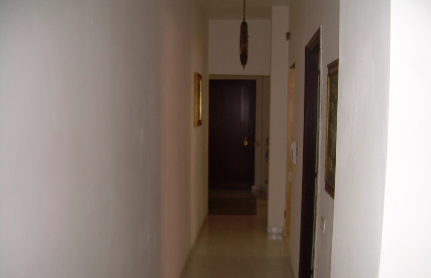 Descrizione: Cucina, 2 bagni, 4 stanze, 3 balconi, ingresso e corridoio + deposito e posto auto scoperto . Mq. 130 + 25 (deposito) + 10 (posto auto scoperto). N.C.E.U. foglio 8 part. 531 sub. 505, con deposito al foglio 8 part. 531 sub. 23 e posto auto scoperto al foglio 8 part. 1395 sub. 10. Libero. Intera Proprietà